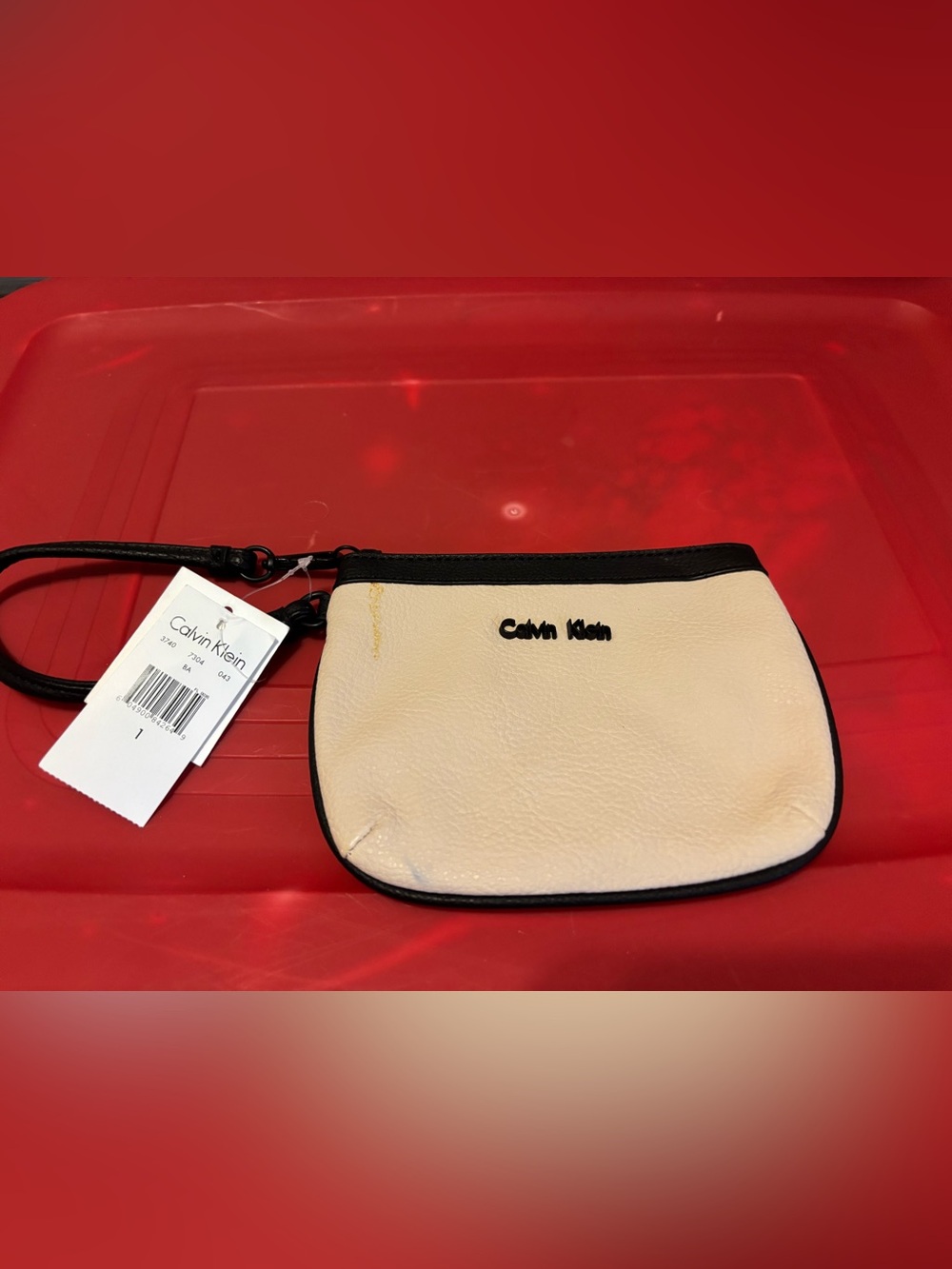 Calvin Klein Cream Wristlet with Black Trim